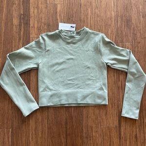 Spandex stretchy material long sleeve cropped shirt from dynamite